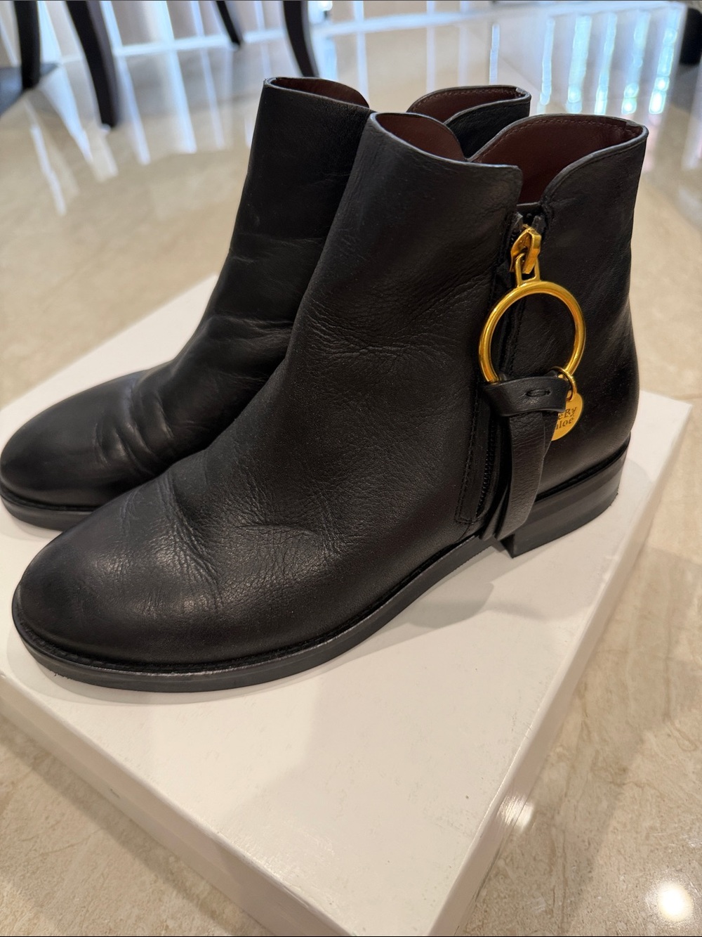 See By Chloé Black Leather Ankle Boots with Gold Ring Detail